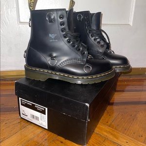 These are 60th anniversary Dr. Martens 1460 leather lace up Raf Simons boots